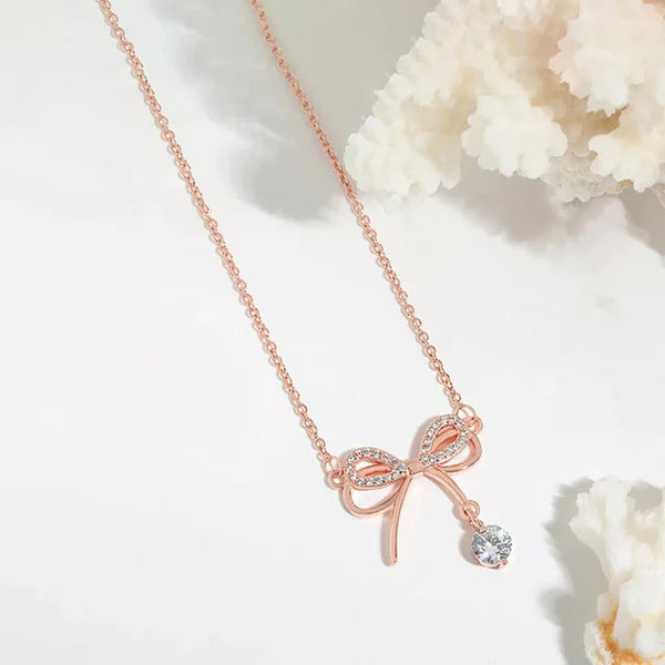 Bow Theory — Rose Gold Ribbon Necklace with CZ Drop NVR-0540