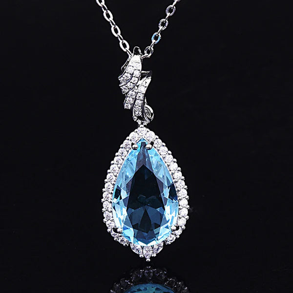 Elsa's Crown Jewel — The Blue Topaz Teardrop Halo Necklace NVR-507