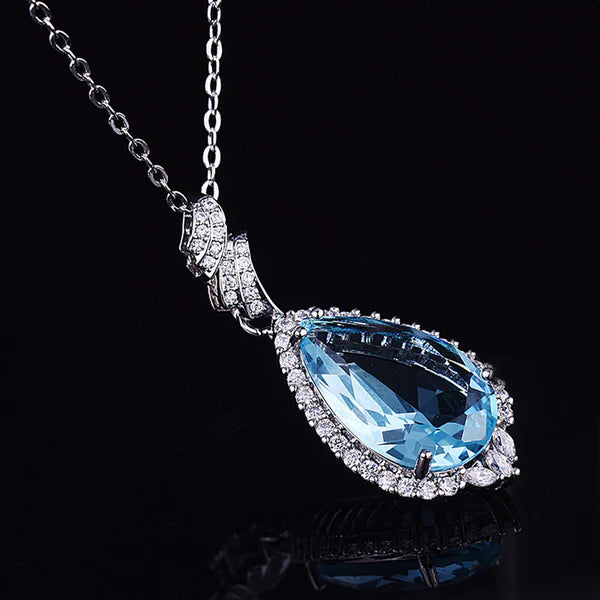 Elsa's Crown Jewel — The Blue Topaz Teardrop Halo Necklace NVR-507