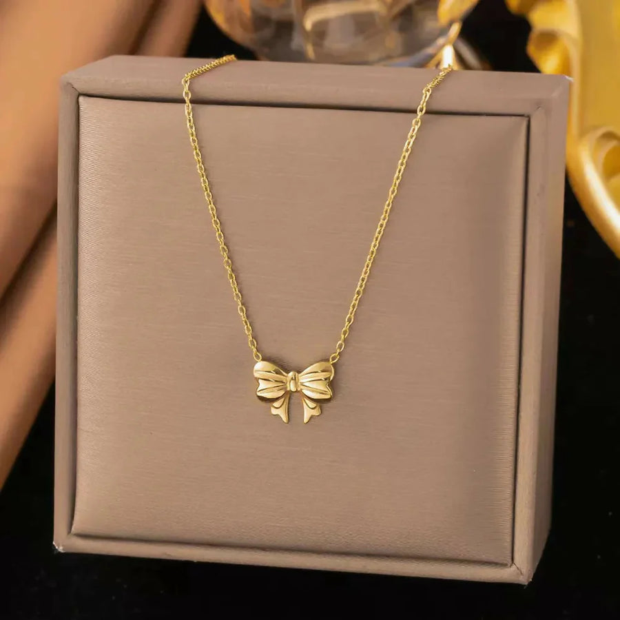 Gold Bow Pendant Necklace NVR-0158