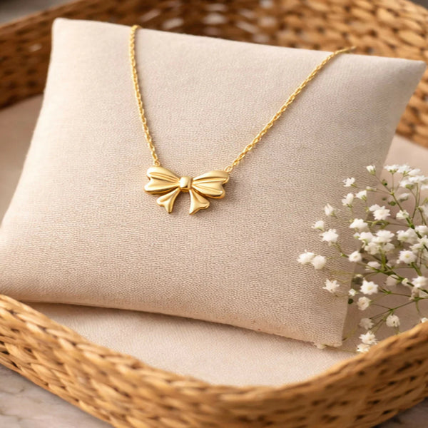 Gold Bow Pendant Necklace NVR-0158