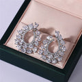 The Ice Crown — Silver CZ Teardrop Hoop Earrings NVR-0551