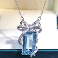 Cinderella's Secret — The Blue Topaz Bow Necklace NVR-0505