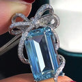 Cinderella's Secret — The Blue Topaz Bow Necklace NVR-0505
