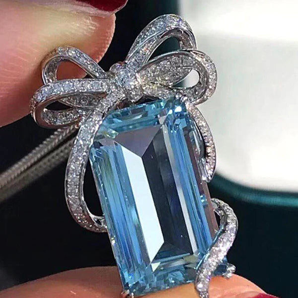 Cinderella's Secret — The Blue Topaz Bow Necklace NVR-0505