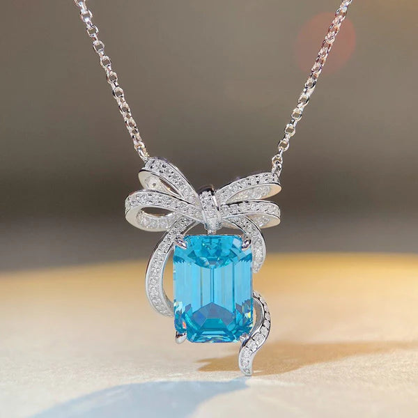 Cinderella's Secret — The Blue Topaz Bow Necklace NVR-0505