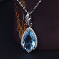 Elsa's Crown Jewel — The Blue Topaz Teardrop Halo Necklace  NVR-507
